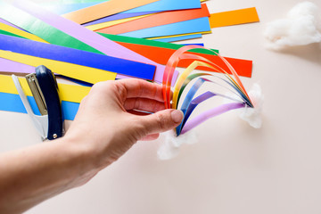 Step-by-step instruction to create a rainbow of colored paper. Creativity with your own hands.