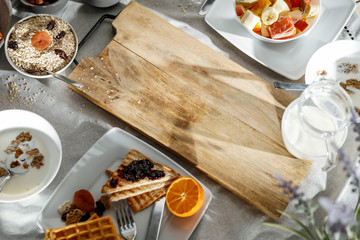 Breakfast on a table in the sunshine on a beautiful holiday day