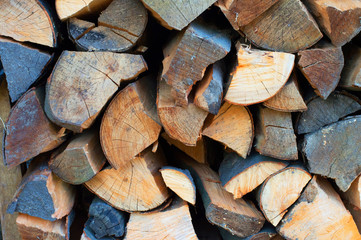 order chopped firewood on a stack.