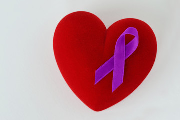 Heart with violet ribbon on white background - Concept of Domestic Violence awareness; Alzheimer's...