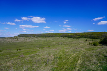 landscape with blue sky and clouds