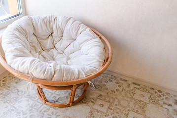 Fototapeta na wymiar Cozy and comfortable round chair. Home interior furniture.