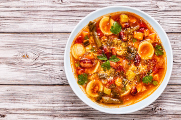 Minestrone, italian vegetable soup with pasta and beans.