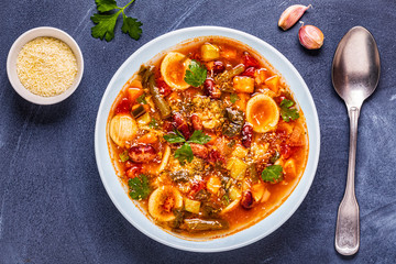 Minestrone, italian vegetable soup with pasta and beans.