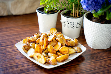 Baked Potato with Onion, Garlic, Rosemary, Salt and Pepper for Summer Barbeque Party