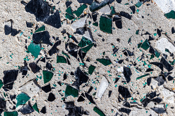 Concrete wall with glass inserts texture. Abstract background for design.
