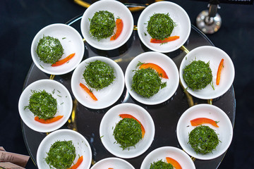 A bowl filled with different types of food on a table