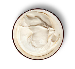 Sour cream in bowl top view