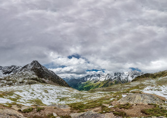 Fototapeta na wymiar Top of Gavia Pass with snow covered mountains