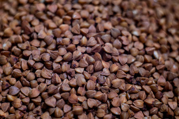 Close-up buckwheat background. Food product porridge buckwheat