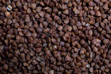 Close-up buckwheat background. Food product porridge buckwheat