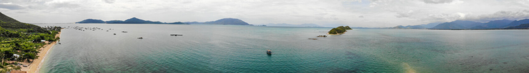 Aerial of Diep Son island, Vanh Ninh, Van Phong Bay, Khanh Hoa. the Island is famous for the white sand road locate under the sea water level connecting two islands with natural scenery wild