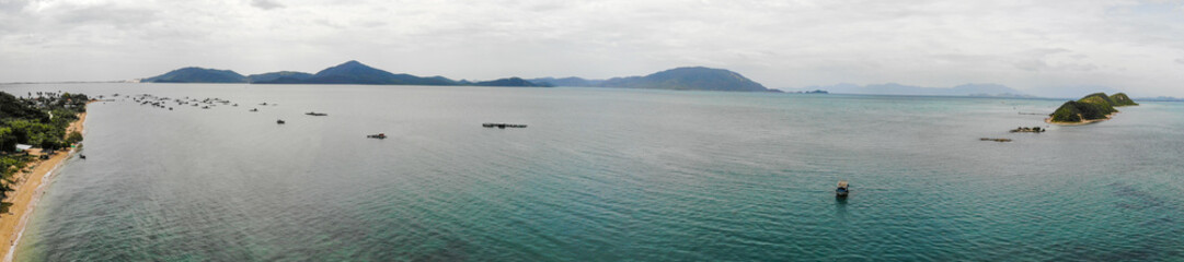 Aerial of Diep Son island, Vanh Ninh, Van Phong Bay, Khanh Hoa. the Island is famous for the white sand road locate under the sea water level connecting two islands with natural scenery wild