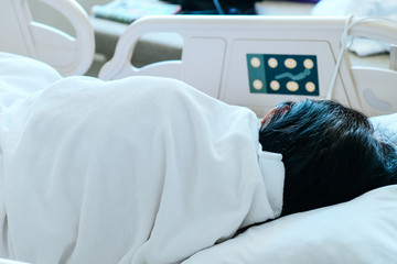 Image of Elderly patients in hospital bed