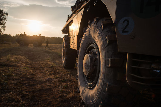 vehicles stoped with a sunset in the background during the preparation in the Canjuers camp of French soldiers leaving for four months of Opex in Mali 
