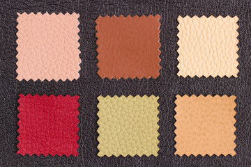 Colored pieces of leather samples for the manufacture of various products laid out in the form of a frame with space for text. Different skin samples. Materials for the leather industry. Flat Lay.
