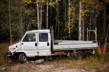 old truck in the woods