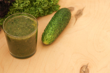 Green healthy smoothie. Salad in a glass. Watch your diet. Vegetarian preferences. Yummy.
