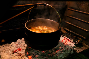 Black Potjie Food South African pot with fire