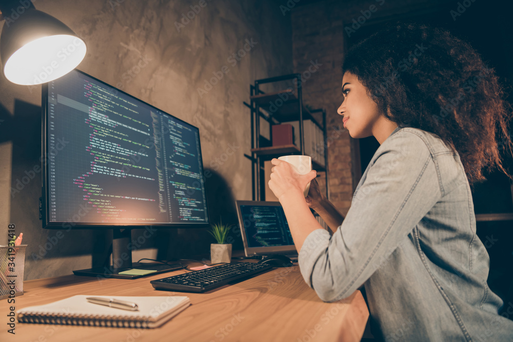 Aufkleber profile side photo focused skilled afro american girl software developer sit evening desk table drin
