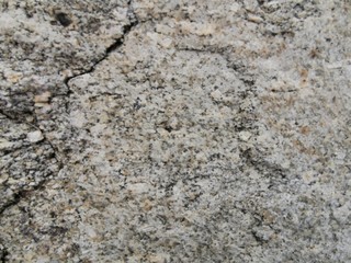 stone gray background, texture of stone wall with cracks