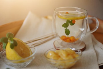 Buckthorn tea with mint, lemon and honey. Healthy drink against viruses