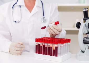 Female doctor in research laboratory. Vaccine research concept