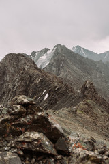 Kyrgyzstan. Karakol. Alakel. A beautiful alpine lake of turquoise color among high snow-capped...
