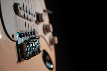 Fototapeta na wymiar Electric guitar stratocaster closeup detail, macro abstract