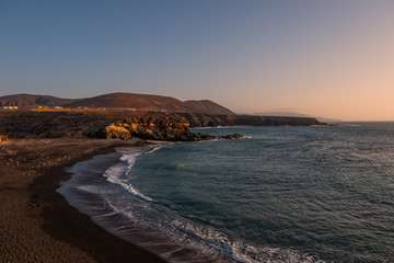 ajuy beach on Fuerteventura islans at sunset. Canary, Spain, october 2019