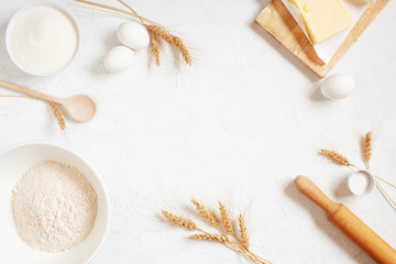 White background with ingredients for baking