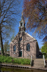 Giethoorn Overijssel Netherlands. During Corona lock-down. Empty streets, paths, bridges and canals. Church