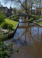 Fototapeta na wymiar Giethoorn Overijssel Netherlands. During Corona lock-down. Empty streets, paths, bridges and canals. 