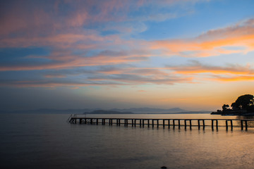 pier in the sea during sunset