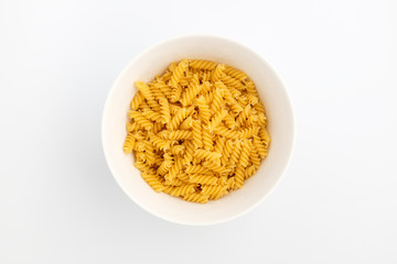 Spiral fusilli on a white background