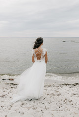 Fototapeta na wymiar Bride in bohemian wedding dress