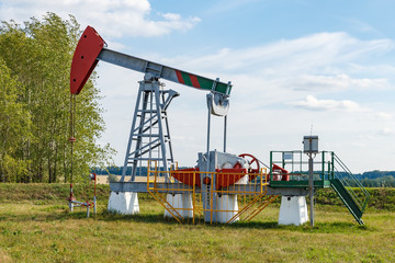 An oil pumpjack. Oil well industry, Russia