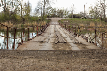 metal pontoon bridge across the river