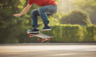 Skateboarder legs skateboarding at outdoors