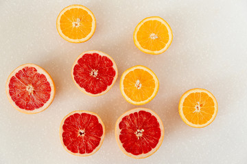 Half of grapefruit, orange, lemon cut for fresh juice. Color splash. Tropical fruits