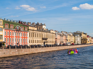 Fontanka river with boat in Saint-Petersburg, Russia. Boats with tourists