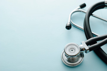 Close up on the disc of a coiled stethoscope