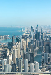 Aerial view of Dubai Marina district and Jumeirah Beach area. Dubai, United Arab Emirates.
