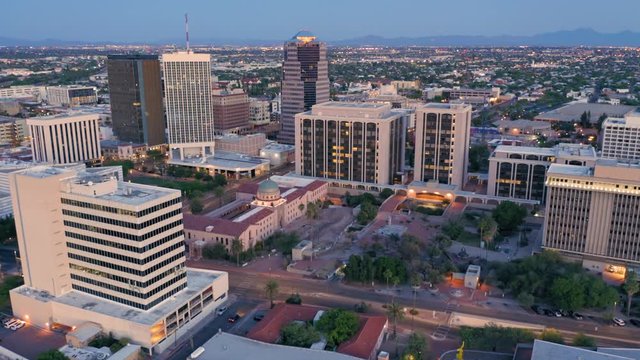 Tucson, Arizona, USA.  Aerial flying over downtown Tucson at sunset.