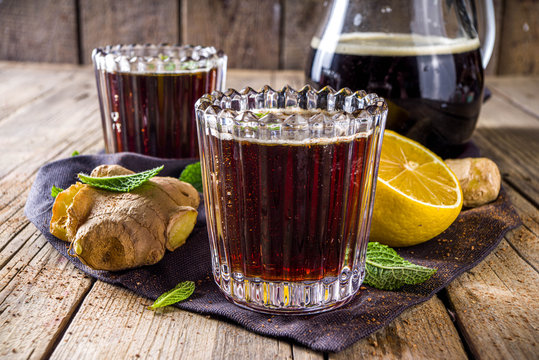 Indian summer refreshment beverage, Panakam Or Gur (Jaggery) Sharbat, Panakaam drink, Traditional sarbats, infusions of fruits, flowers, herbs, roots, rustic wooden background copy space