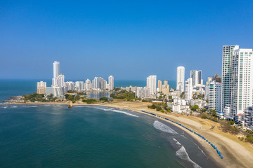 Fototapeta na wymiar Resorts of South America. Aerial view of the Caribbean coast in a modern tourist area of the city.