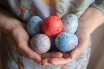 hands holding easter eggs