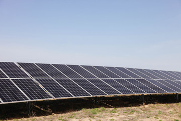 Power plant with solar panels