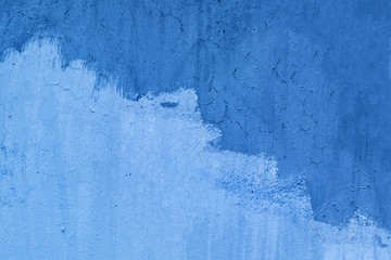 The background is painted gray wall stains grunge