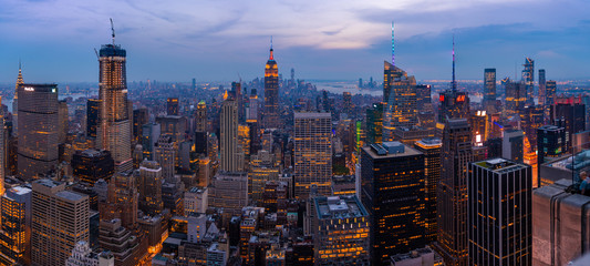 New York City night skyline with cityscape and skyscrapers in Manhattan
